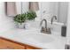 Close-up of the bathroom vanity featuring a white countertop and a neutral color scheme at 9047 Harbor Wind Ave, Las Vegas, NV 89178