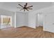 Bedroom with ceiling fan and sliding door access to the backyard at 9047 Harbor Wind Ave, Las Vegas, NV 89178