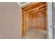 Interior view of shed featuring wood frame walls, ceiling, and flooring at 9047 Harbor Wind Ave, Las Vegas, NV 89178