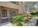 Charming home exterior with a well-maintained garden and inviting entryway at 9070 Spring Mountain Rd # 114, Las Vegas, NV 89117