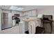 Efficient kitchen featuring stainless steel appliances, including refrigerator, oven, and microwave at 9070 Spring Mountain Rd # 114, Las Vegas, NV 89117