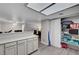 Spacious kitchen with lots of cabinet space and view into the living room and fireplace at 9070 Spring Mountain Rd # 114, Las Vegas, NV 89117