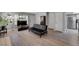Cozy living room with sleek flooring and bright natural light from nearby windows at 9070 Spring Mountain Rd # 114, Las Vegas, NV 89117