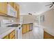 Kitchen featuring gas range and views of living area at 9451 Natoma Station Pl, Las Vegas, NV 89123