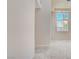 Neutral living room featuring staircase and high ceilings at 9451 Natoma Station Pl, Las Vegas, NV 89123