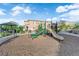 A community playground featuring a slide, play structure, and seating area, perfect for outdoor recreation at 1017 Huckburn Ave, Henderson, NV 89015