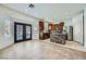 Beautiful kitchen with stainless appliances, stone island, and access to the backyard pool at 10428 Mulvaney Cir, Las Vegas, NV 89141