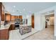 Modern kitchen with stainless steel appliances, granite countertops, and an island with a stone base at 10428 Mulvaney Cir, Las Vegas, NV 89141