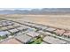 Panoramic aerial view of a neighborhood with single-Gathering homes, mature landscaping, and desert backdrop at 10972 Dixie Johnson Ave, Las Vegas, NV 89166