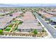 Overhead shot of a single-story home featuring landscaped yards in a planned community setting at 10972 Dixie Johnson Ave, Las Vegas, NV 89166