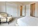 Comfortable bedroom features a queen bed, carpet, and sliding closet doors, offering ample storage at 10972 Dixie Johnson Ave, Las Vegas, NV 89166