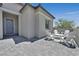 Inviting courtyard with patio seating, perfect for outdoor relaxation at 112 Springbough Ln, Las Vegas, NV 89138