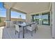 Covered patio features an outdoor dining area with a bar, perfect for entertaining guests at 112 Springbough Ln, Las Vegas, NV 89138