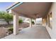 Backyard covered patio, featuring ceiling fans and generous space for outdoor gatherings at 1206 Evening Canyon Ave, Henderson, NV 89014