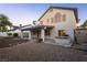 Expansive backyard featuring a covered patio, built-in bar, and easy to maintain landscape at 1206 Evening Canyon Ave, Henderson, NV 89014