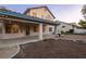 Home with covered patio, providing ample space for outdoor seating and entertaining at 1206 Evening Canyon Ave, Henderson, NV 89014
