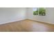 Bedroom featuring wood flooring and natural light at 1371 Cumulus Ct, Henderson, NV 89014