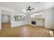 Spacious and bright living room with modern fireplace and light wood floors, perfect for entertaining at 1371 Cumulus Ct, Henderson, NV 89014