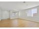 An open living area features natural light, modern lighting, and vinyl flooring at 1371 Cumulus Ct, Henderson, NV 89014