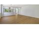 Open-concept living area with wood-look floors and a light, airy ambiance at 1371 Cumulus Ct, Henderson, NV 89014
