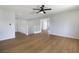 Spacious loft featuring modern flooring, a ceiling fan and open staircase at 1371 Cumulus Ct, Henderson, NV 89014