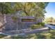Stone sign for Colony Lake community with manicured landscaping at 15 Emerald Dunes Cir, Henderson, NV 89052
