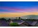 Stunning city view at sunset from a residential area with mountains in the distance at 1637 Wellington Springs Ave, Henderson, NV 89052