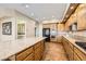 Spacious kitchen with a large island, granite counters, and stainless steel appliances at 1637 Wellington Springs Ave, Henderson, NV 89052