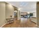 Inviting living room features wood floors, skylights and views of mountains in the distance at 1637 Wellington Springs Ave, Henderson, NV 89052