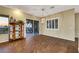 Living room area with wood floors, bright chandelier, and mountain views at 1637 Wellington Springs Ave, Henderson, NV 89052