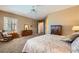 Comfortable main bedroom featuring plantation shutters and stylish furnishings at 1637 Wellington Springs Ave, Henderson, NV 89052
