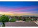 Panoramic neighborhood view showcasing city lights and serene mountain backdrops at 1637 Wellington Springs Ave, Henderson, NV 89052