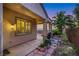 Covered patio with an outdoor grill and scenic views of the manicured landscaping at 1637 Wellington Springs Ave, Henderson, NV 89052