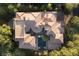 Expansive estate with lush landscaping, multiple wings, resort-style pool, and pristine roof at 17 Soaring Bird Ct, Las Vegas, NV 89135