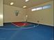 Spacious private indoor basketball court featuring high ceilings and natural light at 17 Soaring Bird Ct, Las Vegas, NV 89135