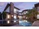 Stunning house exterior with a pool, spa, and architectural details at 17 Soaring Bird Ct, Las Vegas, NV 89135