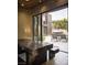 View of the backyard featuring a table, lounge chairs, and patio area at 17 Soaring Bird Ct, Las Vegas, NV 89135