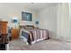 Inviting bedroom with a colorful bed, side tables, and ample natural light at 2079 Port Royal Dr, Laughlin, NV 89029