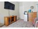 Cozy bedroom features include a large television and a mini-fridge for modern convenience at 2079 Port Royal Dr, Laughlin, NV 89029