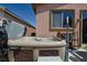 Outdoor hot tub with built-in features, set against a backdrop of a well-maintained backyard at 2079 Port Royal Dr, Laughlin, NV 89029