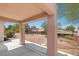 Cozy covered back patio overlooking a well-maintained yard at 2154 Eagle Sticks Dr, Henderson, NV 89012