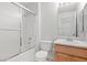 Well-lit bathroom with a shower-tub combination and traditional vanity at 2154 Eagle Sticks Dr, Henderson, NV 89012