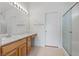 Spacious bathroom featuring double sinks, ample counter space, and a separate shower at 2154 Eagle Sticks Dr, Henderson, NV 89012