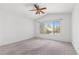 Bright bedroom with ceiling fan and a large window offering ample natural light at 2154 Eagle Sticks Dr, Henderson, NV 89012
