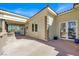 View of the back of the home showing a covered patio and outdoor entertainment space at 2200 Glenbrook Way, Las Vegas, NV 89117