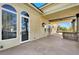 Exterior showing the back of the home with a covered patio and decorative columns at 2200 Glenbrook Way, Las Vegas, NV 89117