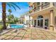 Expansive backyard with pool and stamped concrete, ideal for outdoor activities at 2200 Glenbrook Way, Las Vegas, NV 89117