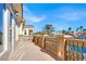 Spacious balcony with decorative railing offers serene lake view and neighborhood ambiance at 2200 Glenbrook Way, Las Vegas, NV 89117