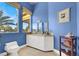 Bathroom featuring vanity with sink, toilet, window, and tile floors at 2200 Glenbrook Way, Las Vegas, NV 89117