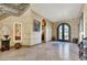 Elegant foyer with marble floors, ornate staircase, and decorative details, creating a luxurious entrance at 2200 Glenbrook Way, Las Vegas, NV 89117